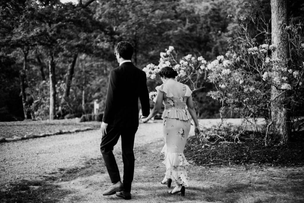 A couple walks hand in hand to their Greenville, SC elopement.